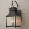 Homesteader Seeded Glass Outdoor Sconce – 3 Light