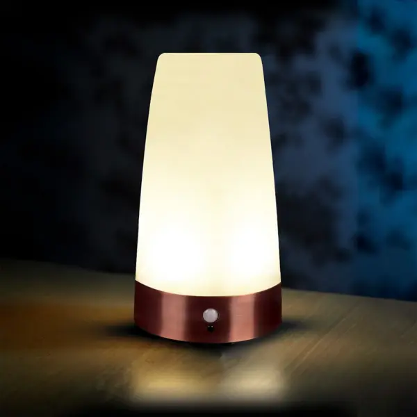 Auraglow round motion-sensor night light – battery powered.